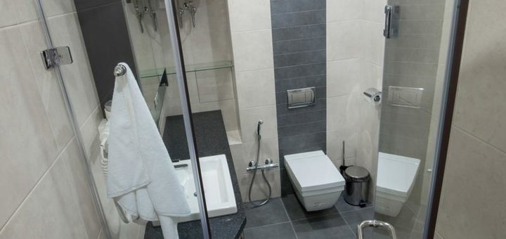 Ванная комната в номере Сидней в отеле 12th Floor Apartments в Одессе