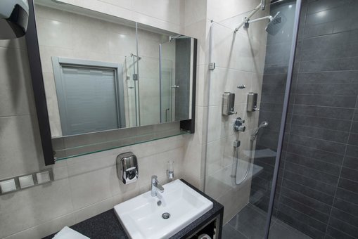 Bathroom of a london room at the 12th floor apartments in odessa