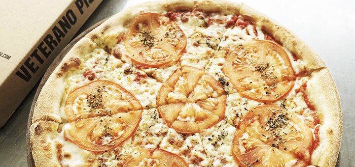 Акція на піцу у ресторані Veterano Pizza. Бронюйте зі знижкою