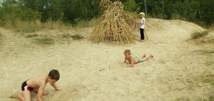 Sandy beach at the robinsonia children&#39;s camp in lysogubovka. buy tickets at a discount.