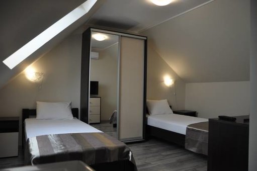 Однокімнатні номери в готелі Поляна Аква Резорт на Закарпатті. Бронюйте номери за акцією.