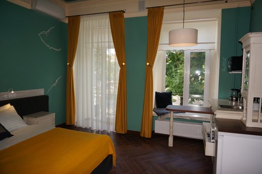 Studio room with a kitchen at the Michelle hotel in Odessa. Book a room at a discount.