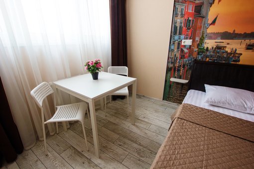 Junior suite at the «East Residence» hotel in Kiev. Book at a discount.