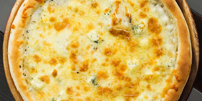 Pizza 4 cheese in the pizzeria "celentano" in the dnieper. order with a discount